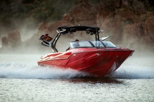 Red ZS232 speeding across lake