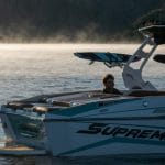 A Supreme logo boat in the water.