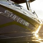 A Supreme boat featuring the iconic logo.