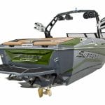 A green and black ski boat by Supreme Boats on a white background.