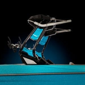 A blue and black Supreme boat with a lift on top.