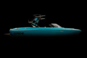 A Supreme boats wakeboard boat on a black background.