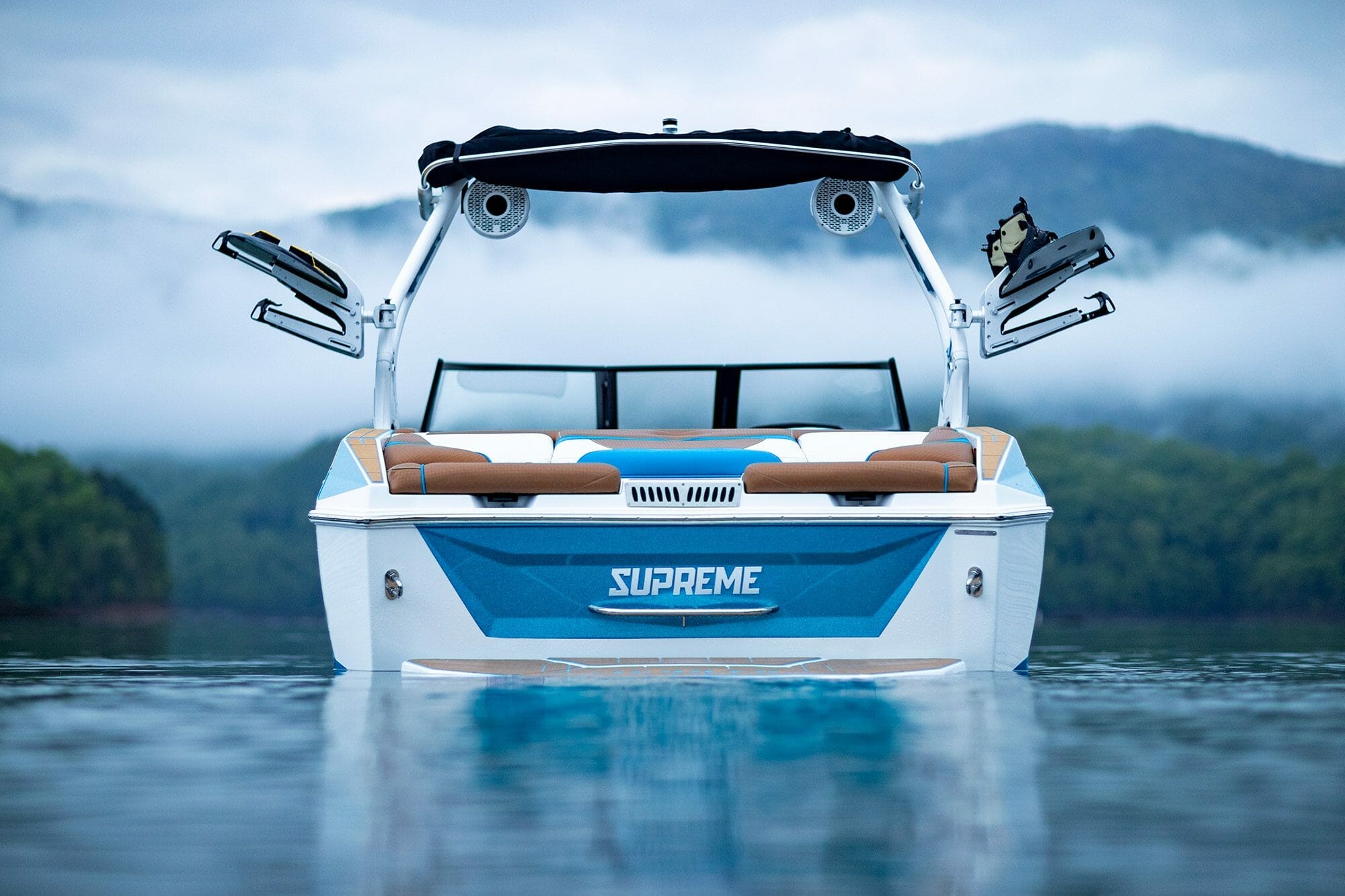 Supreme Boats floating in water.