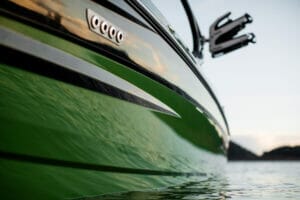 Supreme S240 boat in the water close up
