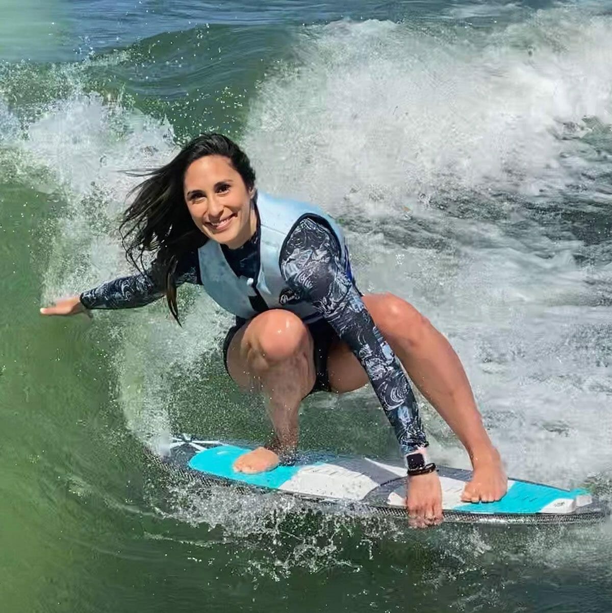 Caitlin Wheeler wake surfing