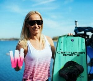 Dallas Friday holding wakeboard