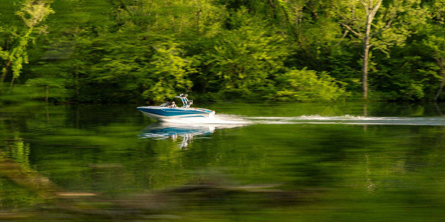 ZS232 racing through lake